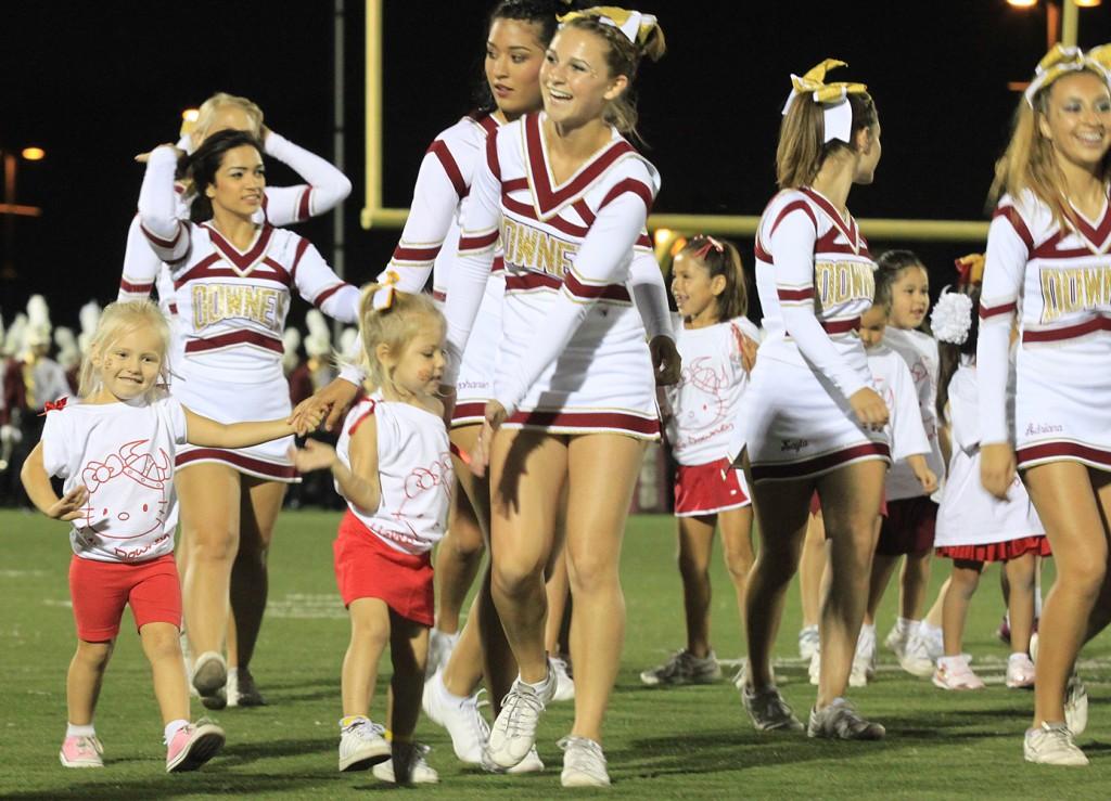 Little girls of all ages are being taught the principles of cheer by both the Varsity and Junior Varsity Lady Vikes through the Cheer Clinic program which performed during the Oct. 1 football game against Bell High School at Allen Lane Stadium. The young blonde twins stole the show that night with their enthusiasm about cheer and touching smiles.