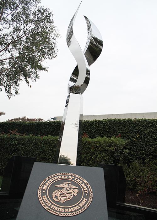 In+November%2C+in+front+of+Downey+City+Hall%2C+a+new+statue+is+resurrected+as+a+veteran%E2%80%99s+memorial.+On+every+corner+around+the+statue+there+is+a+plaque+of+each+department+of+the+military+to+represent+the+Navy%2C+Marines%2C+Army%2C+and+Air+Force.