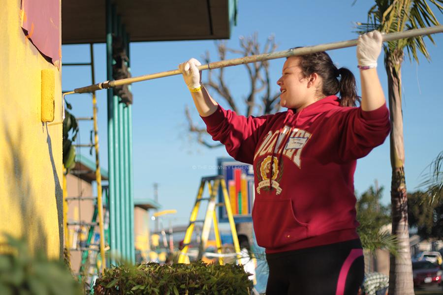 On January 19, Jessica Samaniego, 11, helps paint Longfellow Elementary School for the Compton Initiative. “I had lots of fun and just knowing that the work we did will make someone happy,” Samaniego said, “it makes me feel great about doing it.”  
