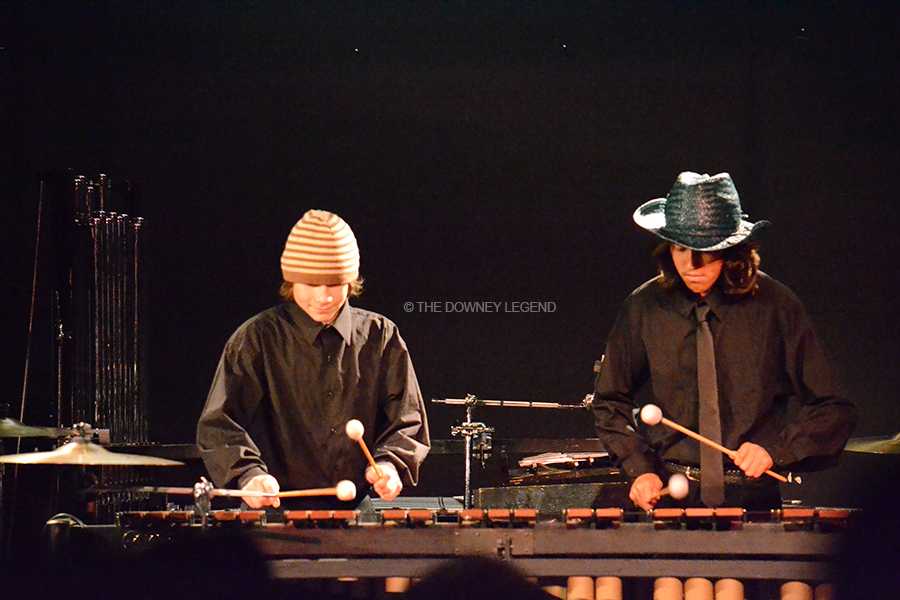 In the theater, John Kilduff, 9, and Julian Rojas, 9, perform under their stage name “Llamas with Hats” for the DHS Percussion and Chamber Music Concert on April 24. The concert was held to fundraise for DHS band.
