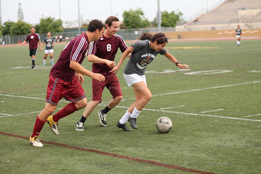 On May 9,during the CIF Champions vs. the Faculty, Mr. Glasser lifts his shirt and runs with excitement after scoring a penalty kick. With Glasser’s goal, he helped his team get one step closer to win