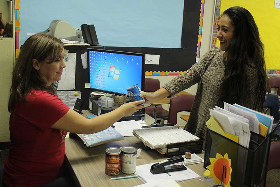On Nov. 14, Mrs. Cubas collects cans for the annual food drive in her classroom to help families in need. “Even though I don’t have a fourth period, I still managed to get some kids to donate cans,” Cubas said.