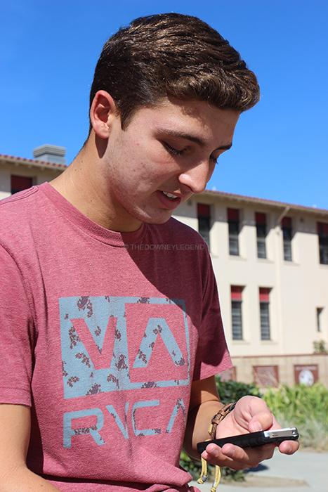            On Nov. 8, Preston Medina, 11, looks through his Vine to see how many people have posted new videos, near the bell tower. Vine was founded in June of 2012 by Dom Hofmann, Rus Yusupov, and Colin Kroll.