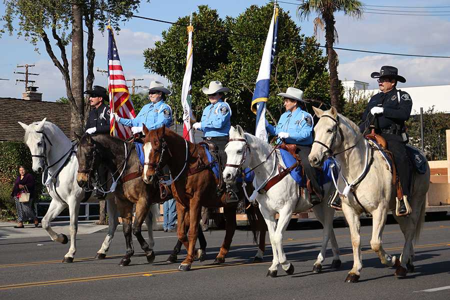 On+Dec.+8%2C+2013%2C+the+Downey+Police+Department+commences+the+annual+Christmas+parade+on+Downey+Ave.+The+parade+was+presented+by+the+Downey+Chamber+of+Commerce.%0A