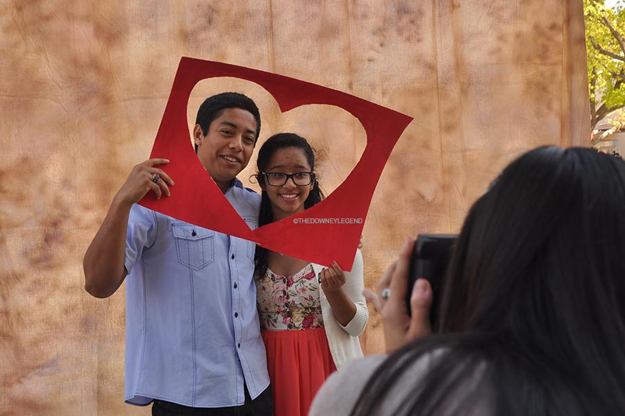 In front of the quad, on Thurs., Feb 13, boyfriend and girlfriend Rafael Segura, 12, and Gabriela Herrarte, 12, take a polaroid together for Valentine’s Day. “I wanted to take a picture as a memory for us,” Herrarte said.