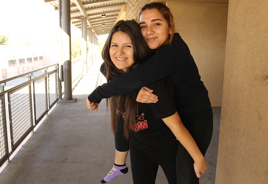 New to the Downey High School campus, Stephanie Gonzalez meets her first and best friend, senior Marlene Oropeza, in her ROP dance class during the first week. “At first it was overwhelming because I didn’t know anyone, but I love the friends that I‘ve made and the people I’ve met,” Gonzalez stated.  