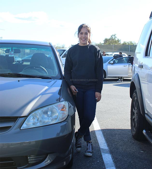 On Feb. 23, in the north parking lot of Downey High School, Lorena Pedroza, 12, explains the pros of gas prices dropping. “I like having extra cash so I can spend on food,” Pedroza said.   