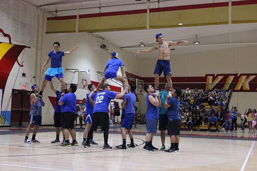 On April 30, Downey High School’s ASB and Stop the Traffick club organize a Battle of the Sexes night rally to fundraise for sex trafficking awareness and introduce spring sports teams.  The man-leaders performed a routine along side the cheerleaders in order to see which sex dominated the cheer game. 
