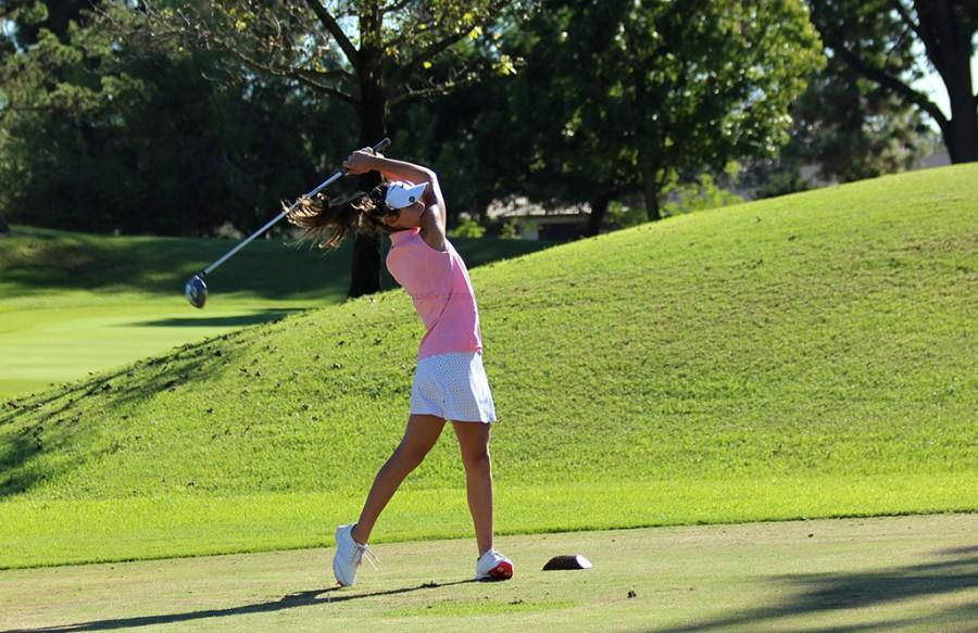 In the match against Warren, freshman, Allison Letender tees off, on September 29, at the Rio Hondo Golf Course. Letender became interested in golf at a young age after playing with her father.