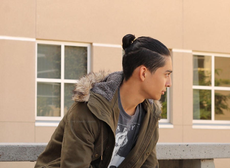 Rocking the hallways of Downey High School, Noah Castillo, 11, wears the man bun, a currently trending hair-do of 2015. “I liked the look ever since I saw it in YouTube,” Castillo said. “I started to wear the trend my sophomore year of 2015.” 