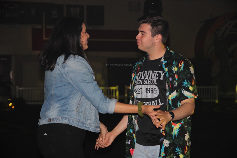 At the Sadie’s Hawkins Welcome To The Jungle themed dance, Robert Molina, 12, and Alyssa Lozano, 11, dance along to Enrique Iglesias’ “Hero” in the gymnasium. The dance was supposed to take place in the quad, but it was later moved to the gym due to weather conditions. 