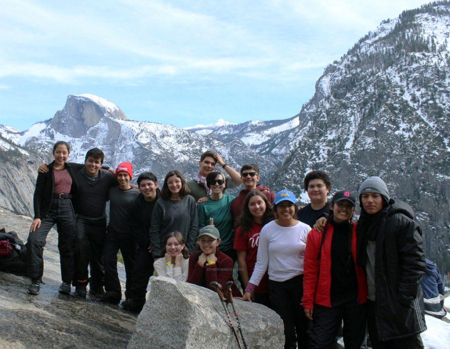After hiking three and a half miles to upper Yosemite Falls, a small group of the AP Environmental Science students, who names themselves Raven Scat, stops to eat lunch with the view of Half Dome on Jan. 17. 
(Photo courtesy of Kristina Cruz)