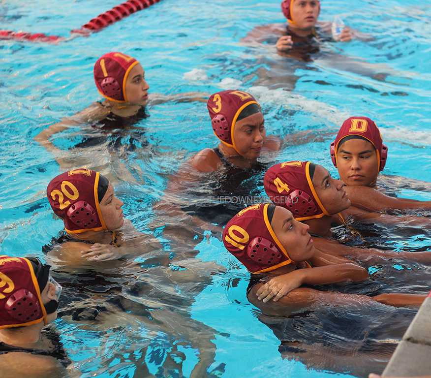The girls water polo team awaits Coach Villa to give them advice about Woodrow Wilson High school to help them defeat them in the first round of C.I.F. They took the win against their opponent and advanced to the second round to C.I.F, reaching their goal to become the girls water polo champions 
