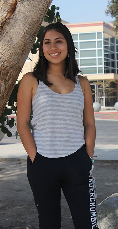 Stressing over college applications Marlene Garcia, 12,admits that she knows what to do already, outside the garden on Sept. 26. “Although I know what to write and what to say,” Garcia said, “t is super stressful knowing this is what determines your future.”