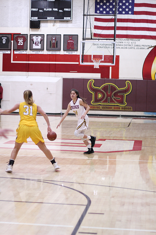 Looking for an open player in their CIF game against Ventura High School on Feb. 7, Alexis Gonzales,12 expresses how her play style is affected by the game. “At the start of a game I play with a calm mindset,” Gonzales said. “If it is a close game I tend to push myself and play above my own limits.”