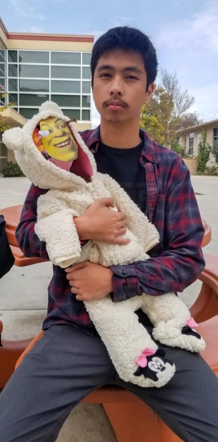 For an AP Psychology project at Downey High School, Jeff Lucena, 12, creates a bottle baby named Shrek and gives insight on parenting. “ Parenting isn't always what it seems,” Lucena said. “You’ll never knows what you're going to get, so just be thankful that you're giving someone else a chance.”
