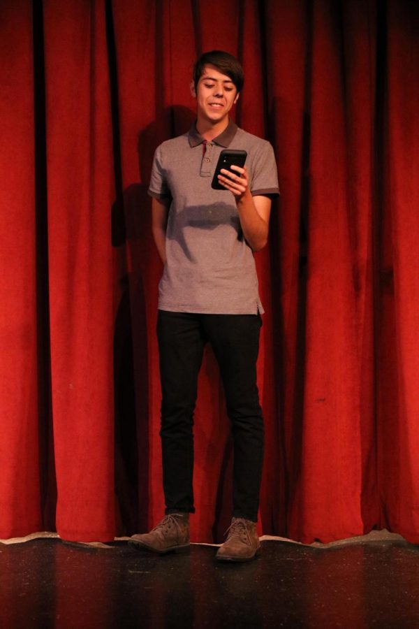 Reciting two poems, Edward Haro, 12, performed at the Writing Center’s Poetry Slam on Feb. 28 in the Downey High Theater. “I tried making any dialogue within it (the poem) different, I did this by changing the accents and stuttering similar to how the boy in the poem did,” Haro said. “I chose these poem because I just wanted people to know how great they were.”