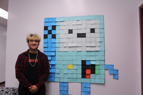 Enjoying computer design, Jermey Ortega, 12, is loving the class and bringing that love into Post-it art. Ortega along with three other students completed BMO, a cartoon character, “it was such a cool experience, we struggled to put it together but we overcame the challenge,” Ortega stated. 