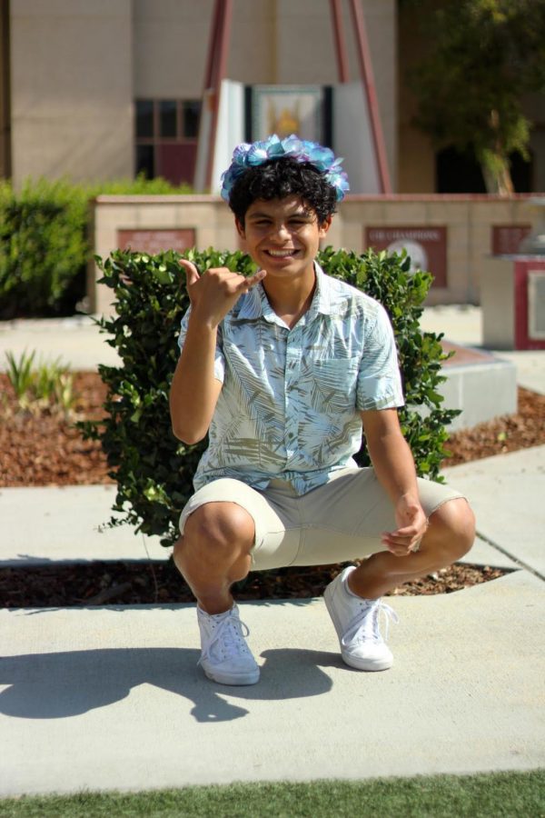 With Hawaiian day being the third spirit week theme, junior, Angel Sanabria expresses his Hawaiian style by wearing a classic floral button up. “It was a fun theme because of the many memories I remember from my cherished trip to Hawaii,” Sanabria said. “I enjoyed dressing up for [Hawaiian Day] because I got to wear my favorite Hawaiian themed shirt and also felt like a tourist.” 
