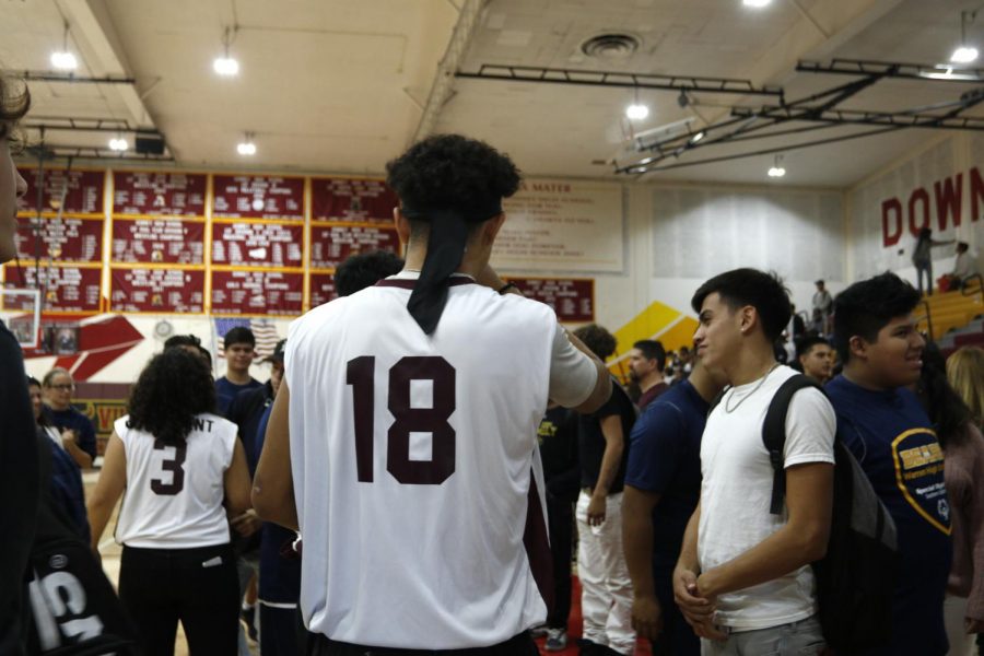 With a score of 17-10, Downey High wins the first ever Downey Unified Special Olympics Basketball Game versus Warren High on November 07, 2019. Downey High’s champions of the day celebrate their victory, taking group pictures to savor the moment and congratulating the Bears for their effort. 
